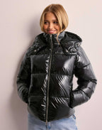 Women's shiny quilted jacket with removable hood in black and burgundy