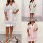 Women's boho midi dress with ethnic print, lace V-neckline and pompon sleeve details