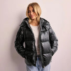 Women's shiny quilted jacket with removable hood in black and burgundy