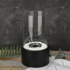 Decorative ethanol oil lamp with metal frame, glass cylinder, and decorative stones, indoor and outdoor