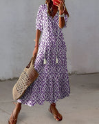 Women's boho maxi dress with loose fit and fringe detail, multiple colours