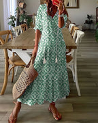Women's boho maxi dress with loose fit and fringe detail, multiple colours