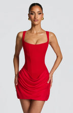Women's mini dress with square neckline, draped skirt and lace-up back