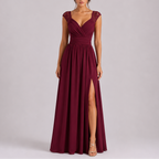 Formal maxi dress with lace shoulder detail and floor-length skirt, sleeveless evening gown