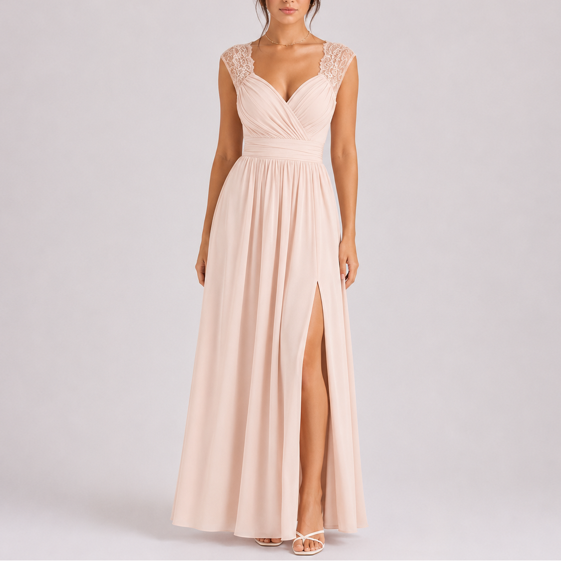 Formal maxi dress with lace shoulder detail and floor-length skirt, sleeveless evening gown
