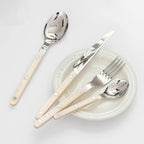24-piece stainless steel cutlery set with engraved design, serves 6