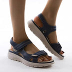 Women mid heel slip-on sandals in beige faux leather strappy design