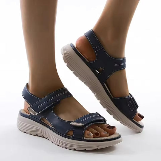 Women mid heel slip-on sandals in beige faux leather strappy design