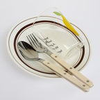 24-piece stainless steel cutlery set with engraved design, serves 6