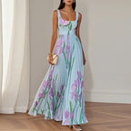 Floral maxi dress with square neckline and pleated skirt, wedding guest style