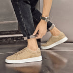 Genuine leather sneakers with subtle textured design and rubber outsole