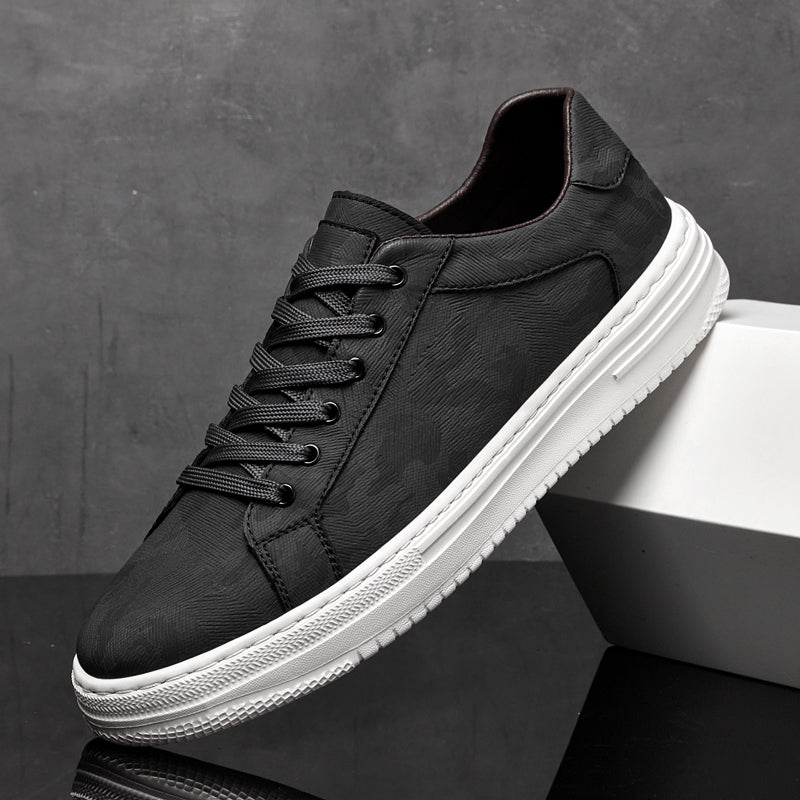 Genuine leather sneakers with subtle textured design and rubber outsole