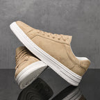 Genuine leather sneakers with subtle textured design and rubber outsole