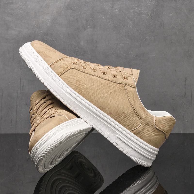 Genuine leather sneakers with subtle textured design and rubber outsole