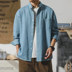 Denim button-up shirt relaxed fit with distressed finish in light blue
