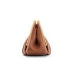 Clutch bag with origami folds and polished gold hexagonal handle in microfiber leather