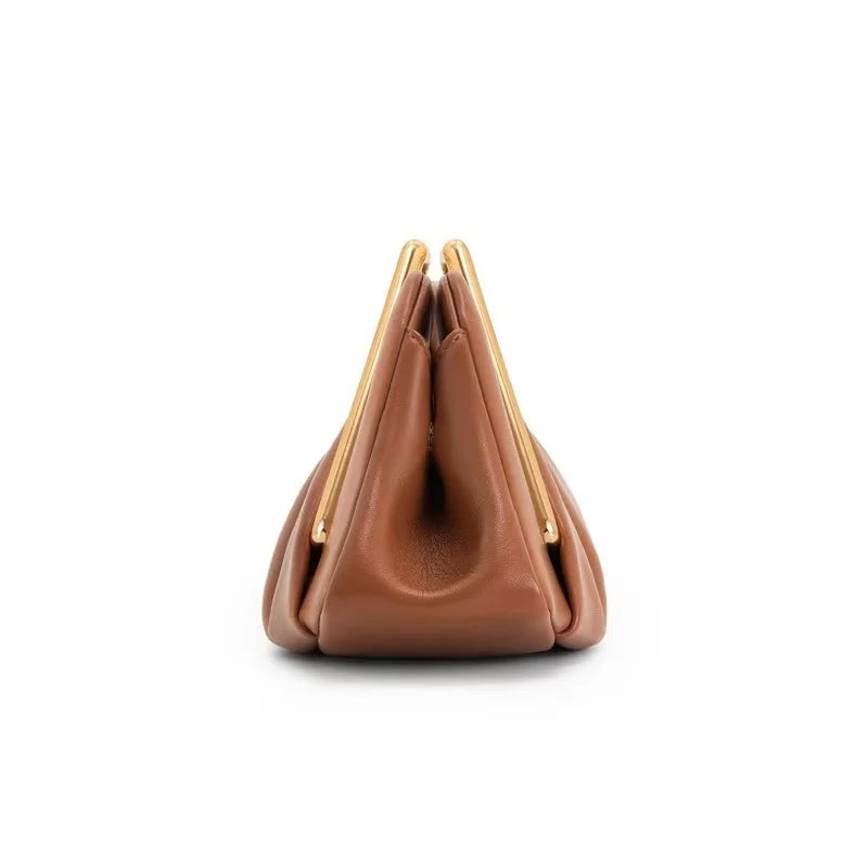 Clutch bag with origami folds and polished gold hexagonal handle in microfiber leather