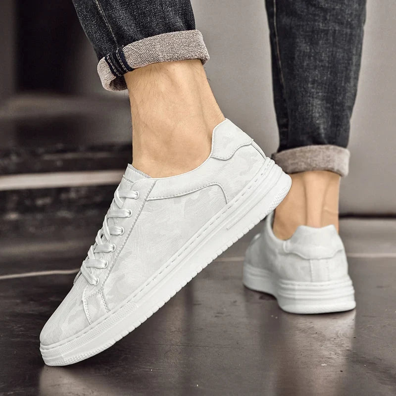 Genuine leather sneakers with subtle textured design and rubber outsole
