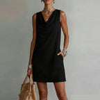 Women's mini dress cowl neck sleeveless A-line silhouette with side pockets