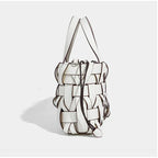 Women handwoven crossbody handbag with top handle in vegan leather