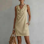 Women's mini dress cowl neck sleeveless A-line silhouette with side pockets