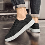 Genuine leather sneakers with subtle textured design and rubber outsole