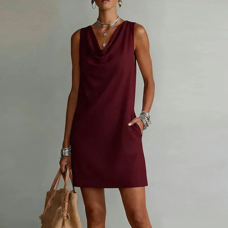 Women's mini dress cowl neck sleeveless A-line silhouette with side pockets