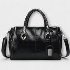 Women structured handbag in a balanced silhouette available in Black Blue Red and Brown