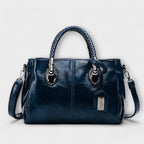 Women structured handbag in a balanced silhouette available in Black Blue Red and Brown