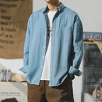 Denim button-up shirt relaxed fit with distressed finish in light blue