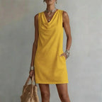 Women's mini dress cowl neck sleeveless A-line silhouette with side pockets