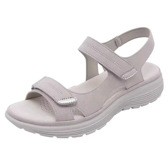 Women mid heel slip-on sandals in beige faux leather strappy design