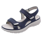 Women mid heel slip-on sandals in beige faux leather strappy design