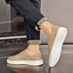 Genuine leather sneakers with subtle textured design and rubber outsole