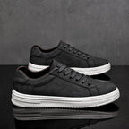 Genuine leather sneakers with subtle textured design and rubber outsole