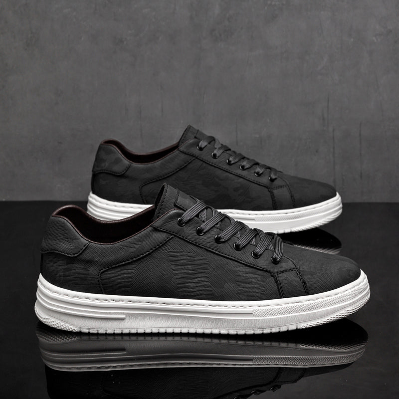 Genuine leather sneakers with subtle textured design and rubber outsole