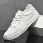 Genuine leather sneakers with subtle textured design and rubber outsole