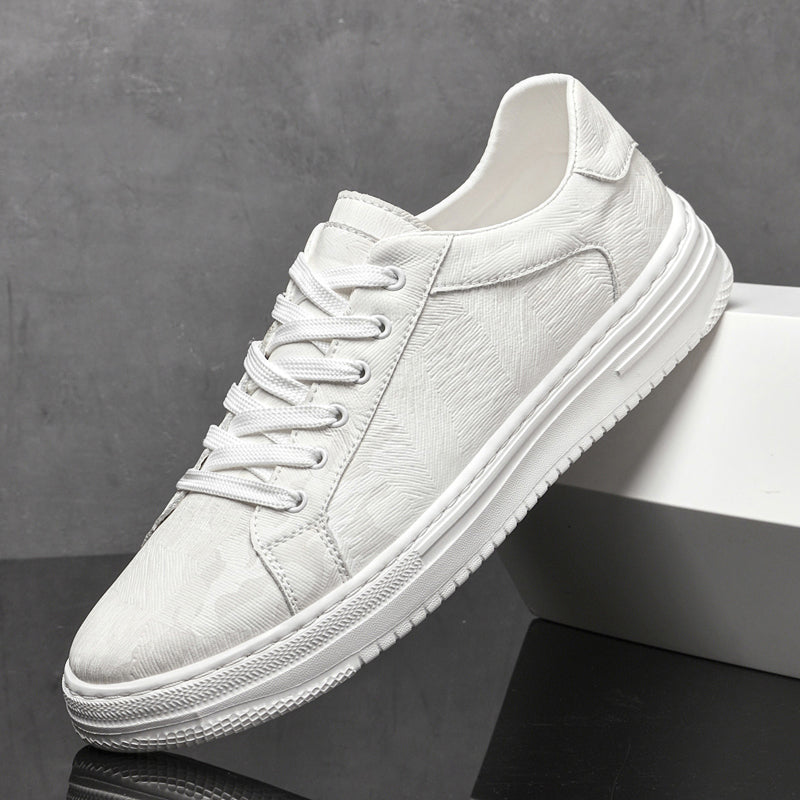 Genuine leather sneakers with subtle textured design and rubber outsole