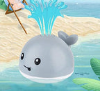 Baby bath toy whale water sprayer with colorful LED lights, safe for toddlers aged 2+