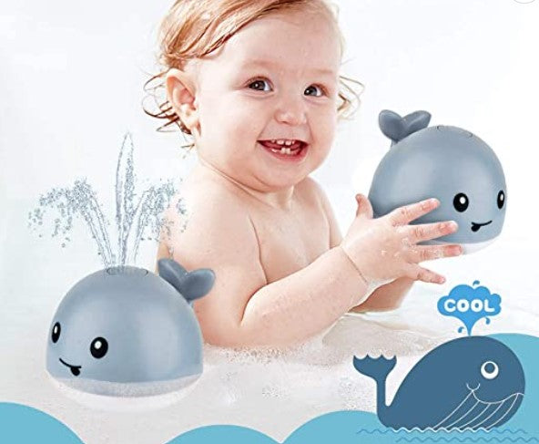 Baby bath toy whale water sprayer with colorful LED lights, safe for toddlers aged 2+