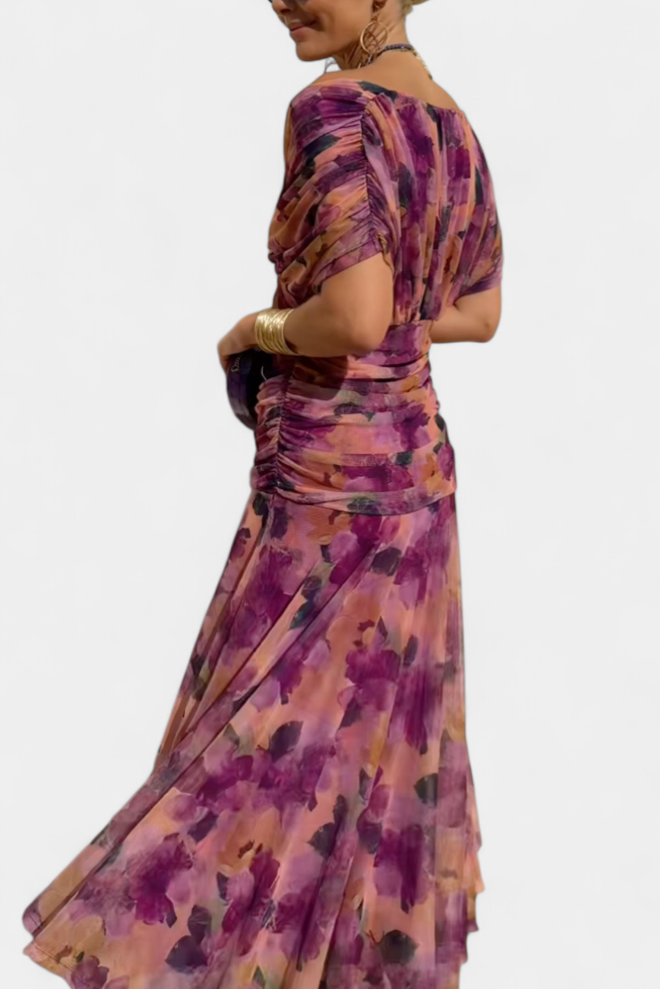 Women's floral midi dress with V-neckline and pleated waist, elegant long flowing skirt