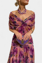 Women's floral midi dress with V-neckline and pleated waist, elegant long flowing skirt