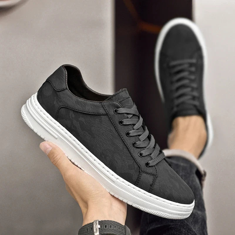 Genuine leather sneakers with subtle textured design and rubber outsole