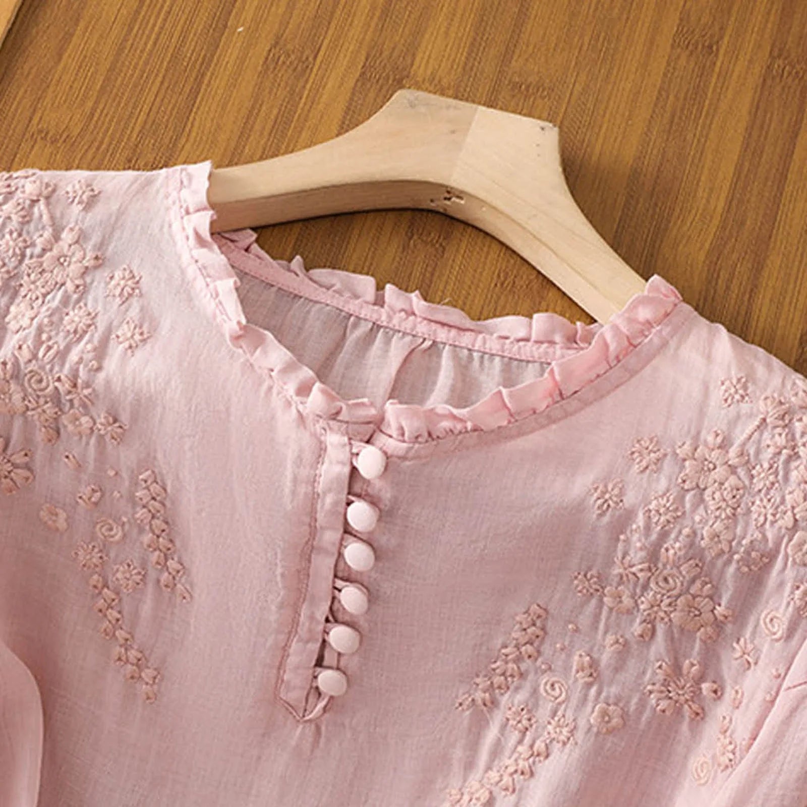 Women embroidered blouse relaxed fit with button detail round neckline short sleeves