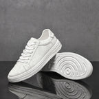 Genuine leather sneakers with subtle textured design and rubber outsole