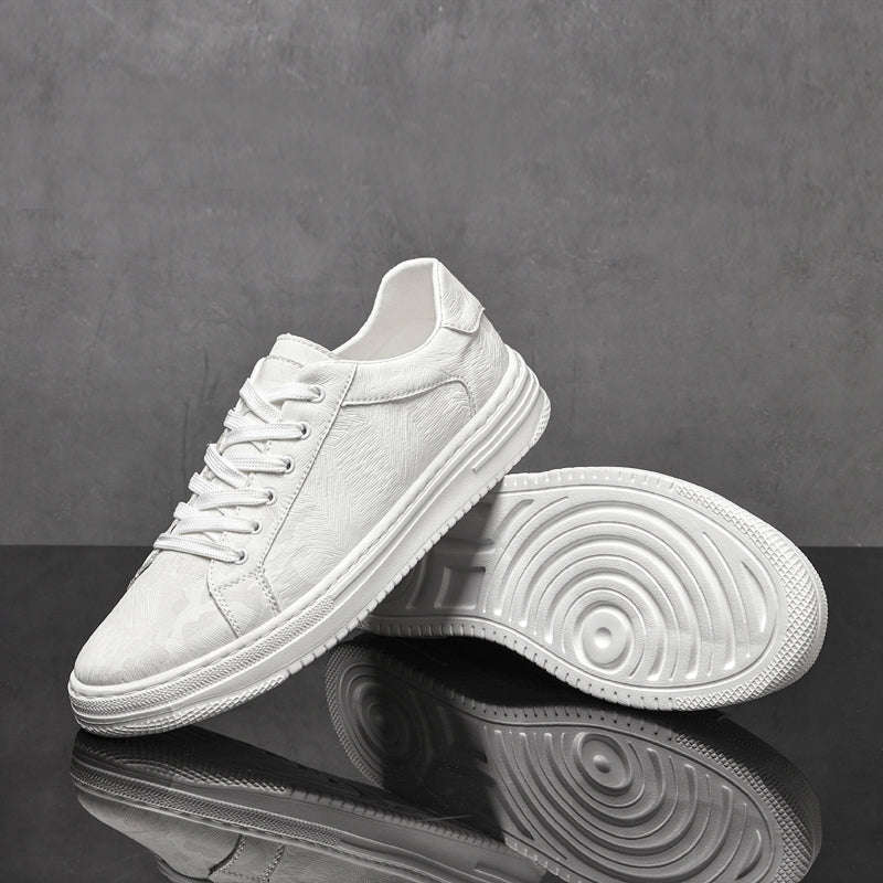Genuine leather sneakers with subtle textured design and rubber outsole