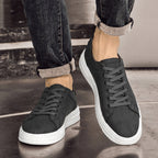 Genuine leather sneakers with subtle textured design and rubber outsole