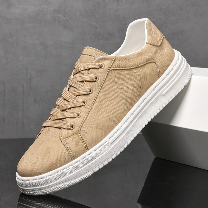 Genuine leather sneakers with subtle textured design and rubber outsole
