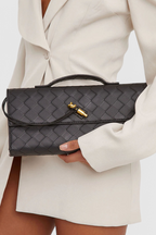 Women vegan leather baguette clutch bag with gold knot hardware and crossbody strap