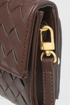 Women vegan leather baguette clutch bag with gold knot hardware and crossbody strap